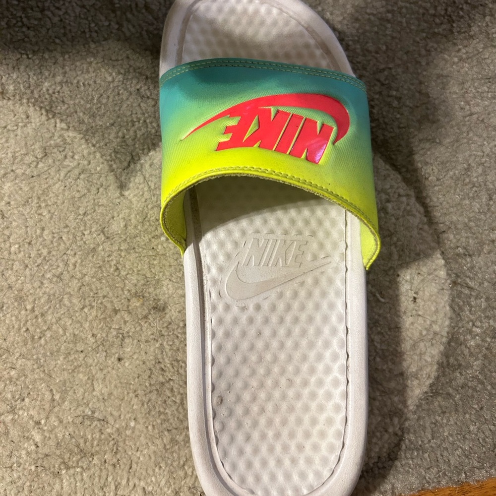 I am selling Nike slides . Worn once or twice still brand new.